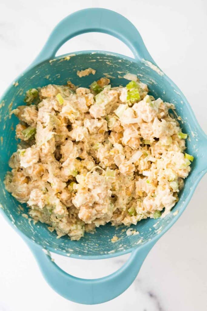 Chickpea Salad Sandwich filling in a blue mixing bowl.